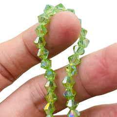 6mm Thunder Polish Glass Crystal Bicone Chrysolite