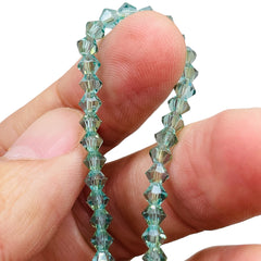 4mm Thunder Polish Glass Crystal Bicone Lt. Aquamarine CG